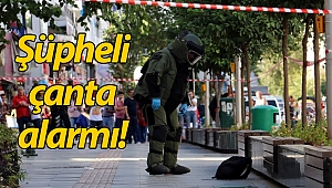 Şüpheli çantayı fark etmeyen engelli kadına polis yetişti (Videolu)