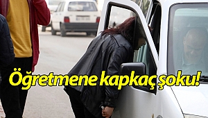 Evinden çıkan kadın öğretmene kapkaç şoku