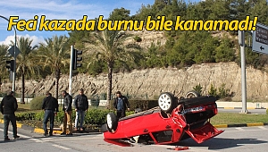 Hurdaya dönen araçtan burnu kanamadan çıktı!