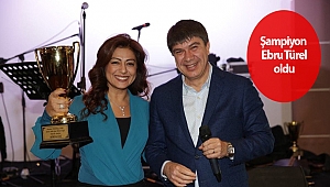 Menderes Türel'den eşine birincilik kupası