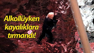 Kafasından yaralandı tedaviyi kabul etmeyip kayalıklara tırmandı! (Videolu)