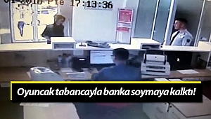 Oğlunun boncuk atan oyuncak tabancasıyla banka soymaya kalktı! (Videolu)