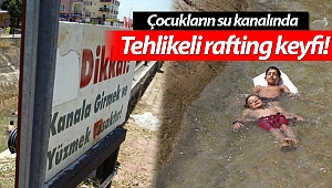 Antalya'da denize gidemeyen çocukların su kanalında tehlikeli rafting keyfi!