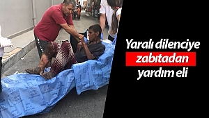 Antalya'da yaralı dilenciye zabıtadan yardım eli!