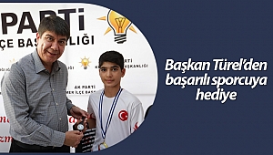 Başkan Türel'den başarılı sporcuya hediye