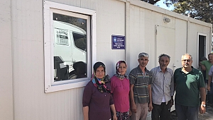 Kumluca'daki yangında evi yanan iki aileye konteyner ev verildi