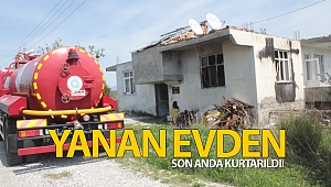 Yanan evden komşusu tarafından çıkarıldı!