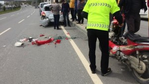 Park halindeki araca çarpan kadın motosikletli yaralandı