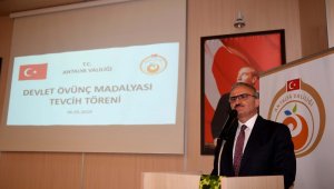Şehit yakınları ve gazilere övünç madalyası