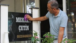 Mezar taşının üzerinde telefon numarasını gören şaşkına dönüyor