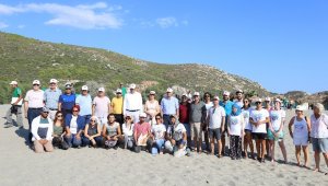 Patara'daki temizlik etkinliğinde 1985 üretim tarihli, 34 yıllık su şişesi dikkati çekti
