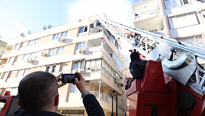 Balkondaki kadını  itfaiye kurtardı