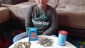 Ömer Tayyip, kitap almak için biriktirdiği parayı kampanyaya bağışladı