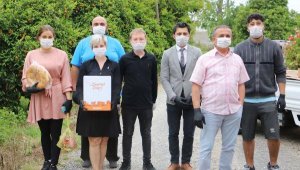 Yerleşik yabancılar Ramazan kolisi dağıttı