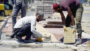 Kepez'de asfalt yol ve kaldırım yapımı sürüyor