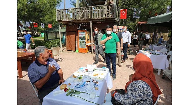 Tütüncü şehit ailelerinin yanında