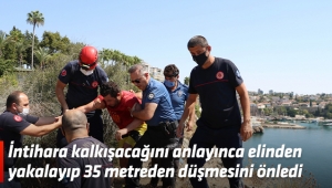 İntihara kalkışacağını anlayınca elinden yakalayıp 35 metreden düşmesini önledi