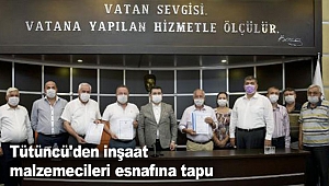 Tütüncü'den inşaat malzemecileri esnafına tapu
