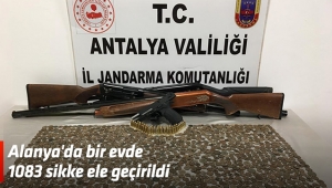 Alanya'da bir evde 1083 sikke ele geçirildi