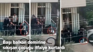 Başı balkon demirine sıkışan çocuğu itfaiye kurtardı