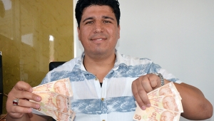 Çektiği paralar arasında, hatalı basım 50 TL çıktı