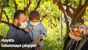 Hayata tutunmaya çalışıyor