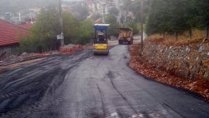 Toprak yola sıcak asfalt