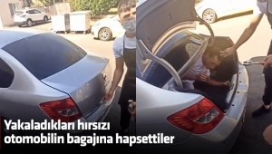 Yakaladıkları hırsızı otomobilin bagajına hapsettiler