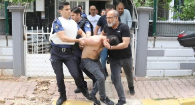 Eline geçeni  sokağa fırlattı