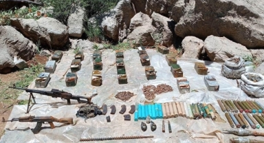 Irak'ın kuzeyinde teröristlere ait silah ve mühimmat ele geçirildi