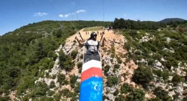 Kanoya binip 'yamaç paraşütü' yaptı