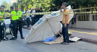 Cansız bedeninin üzeri plaj şemsiyesiyle örtüldü