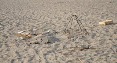 Caretta yuvası üzerinde mangal yakan 2 kişiye para cezası