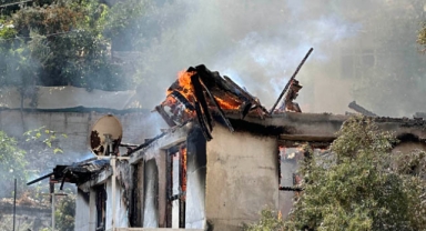 Kurtarmak istediği eşiyle birlikte öldü