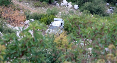 Eşiyle tartışıp, boş otomobili uçuruma itti