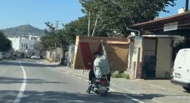 Motosikletle 178 ekran televizyonu taşıdılar