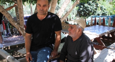 Serik'te çıkan yanında yaşlı adam ve kedisi kurtuldu