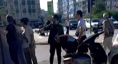 Şiddetli rüzgar; üzerine tabela uçan kadın yaralandı