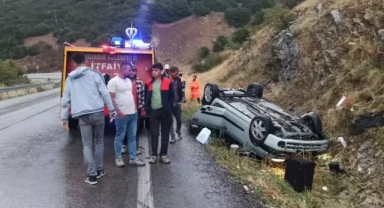 Otomobil takla attı: Yara almadan kurtuldular