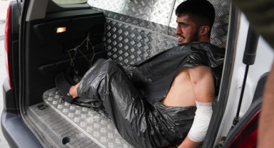 Polisi şehit eden şüpheli çöp poşeti giydirilerek adliyeye götürüldü