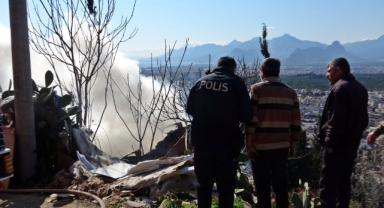 Evinin yanışını çaresiz gözlerle izledi
