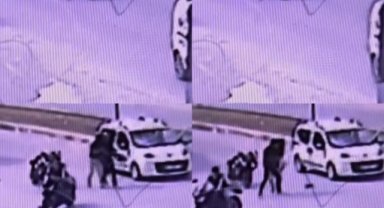 Otomobile kaskla saldırdı