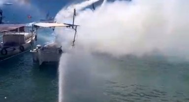 Yanan tekneye hortum, jet ski ve flyboard ile müdahale