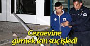 Cezaevine girmek için bankayı taşlayıp cam kapıyı kırdı