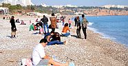 Güneşi gören sahile koştu
