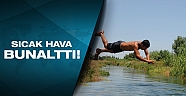 Sıcaktan bunalan kanala atlıyor