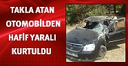 Takla atan otomobilden hafif yaralı kurtuldu