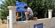 Tepki çeken mezarlık tabelası değiştirildi