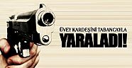 Üvey kardeşini tabancayla yaraladı